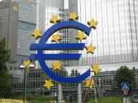 Huge sculpture of blue euro symbol with yellow stars