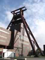 Diagonal metal structure over brick mine building